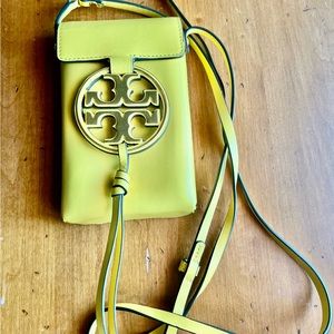 Tory Burch iPhone crossbody. Excellent condition. Yellow leather. Gold logo.